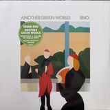 Cover image of Brian Eno's Another Green World album provided by the Discogs API, showing quality issues including a visible sticker and distracting reflection.