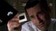 A scene from Mad Men where the main character shifts focus away from a product's technical features and instead demonstrates its emotional impact through the power of nostalgia.